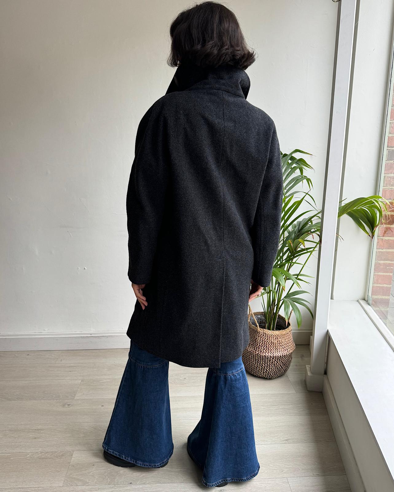 Back view of stylish grey wool blend coat from Acne Studios