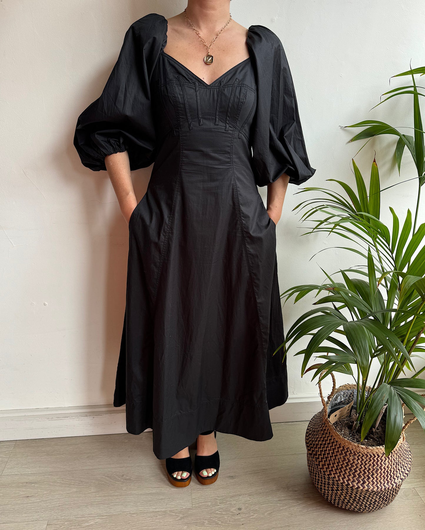 Black Aje Dress ~ Size 8 hands in pockets