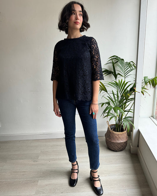 Front view of navy lace top from Goat