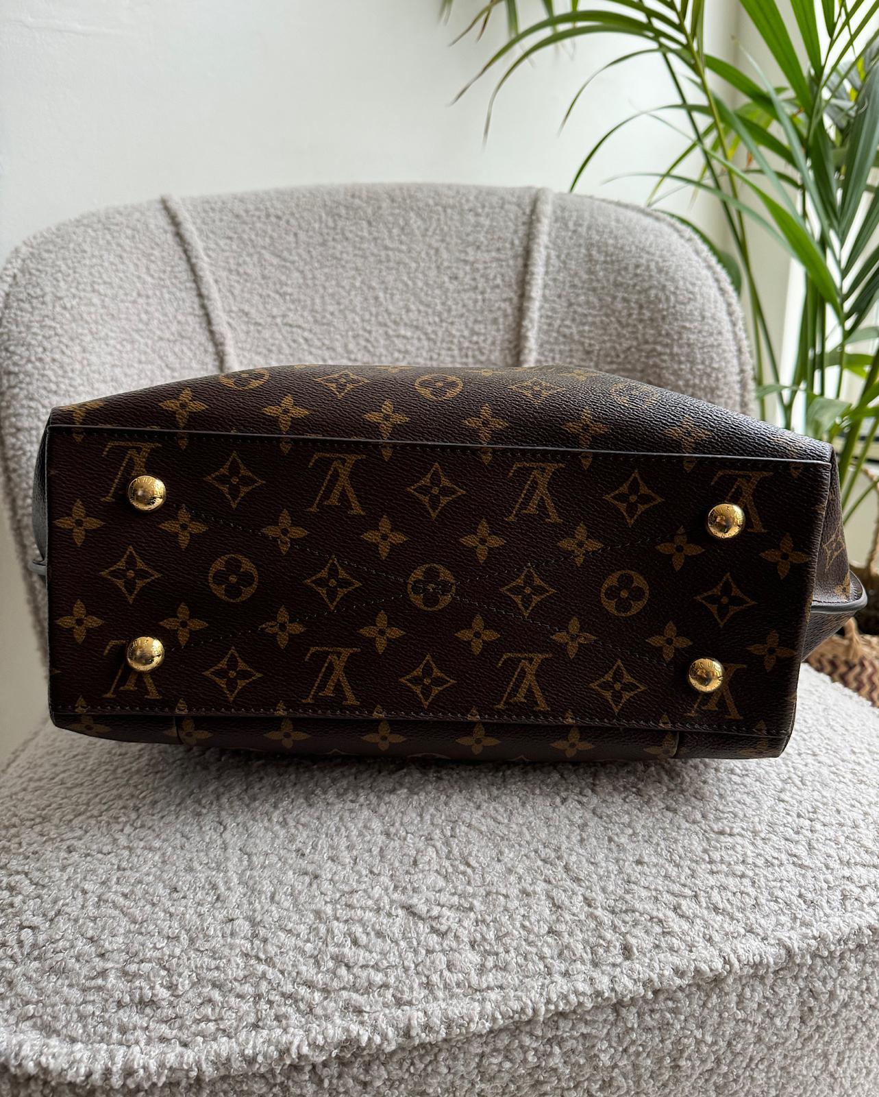 Botton view of beautiful Methis Hobo tote by Louis Vuitton 