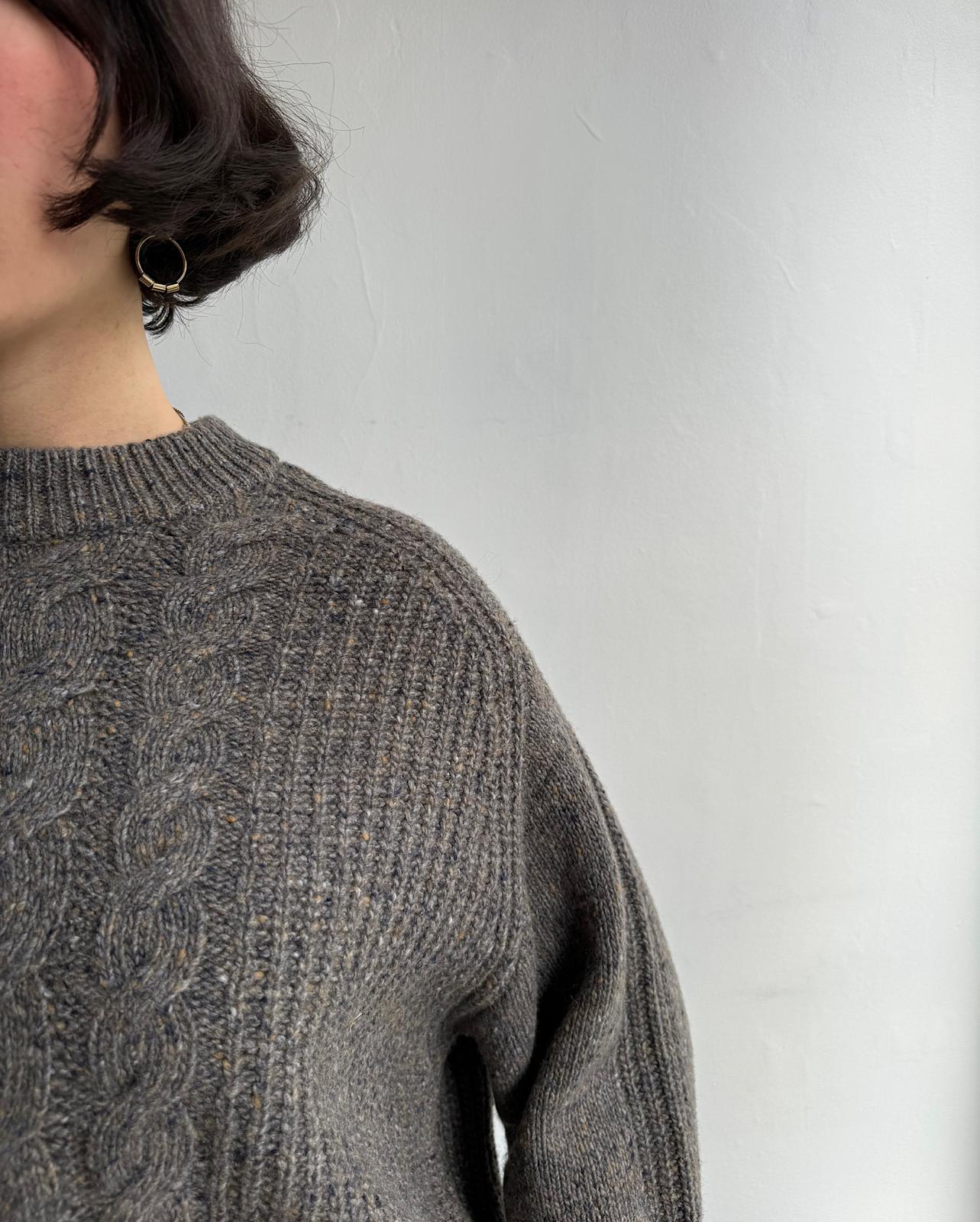 Close up of soft cable-knit 'Delora' sweater by Vanessa Bruno in taupe