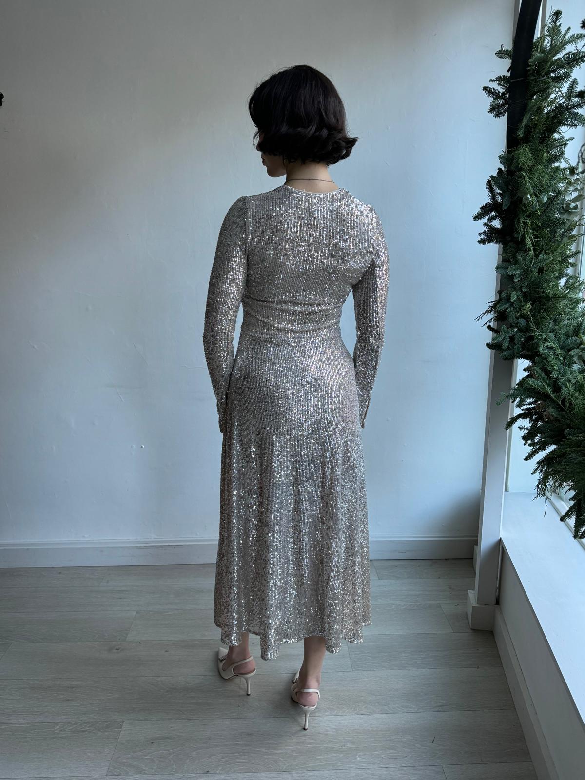 Back view of stylish silver sequined party cocktail dress from Rotate