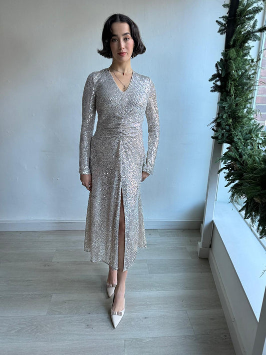 Front view of stylish silver sequined party cocktail dress from Rotate