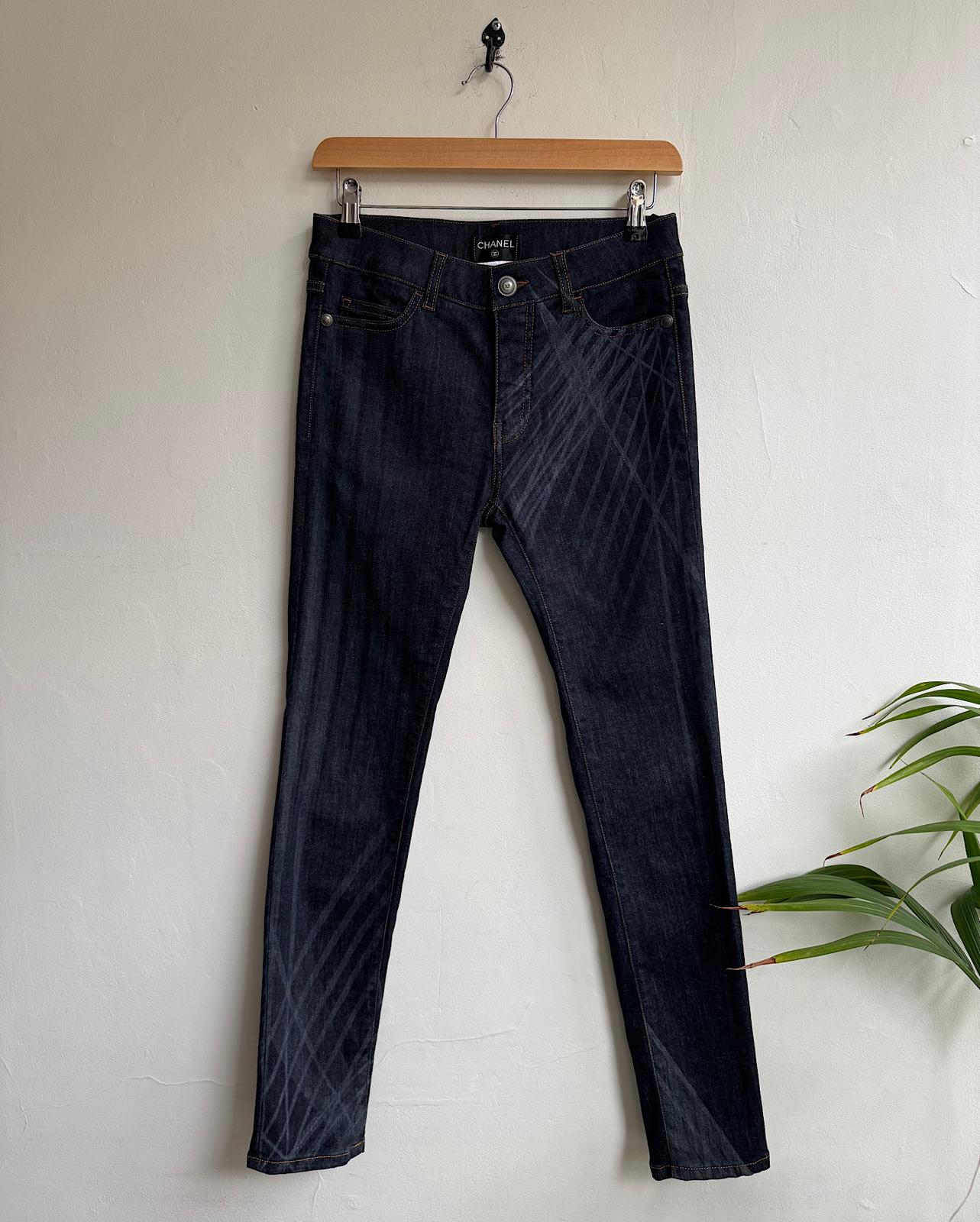 Full view of A gorgeous pair of dark wash denim skinny jeans from Chanel