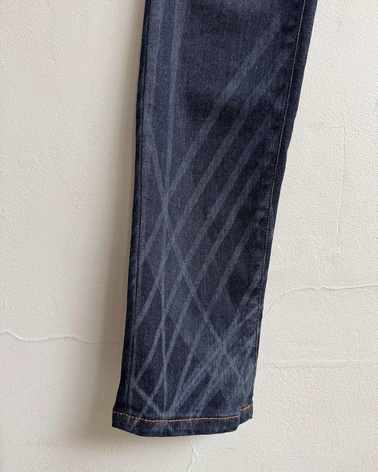 Leg detail of gorgeous pair of dark wash denim skinny jeans from Chanel