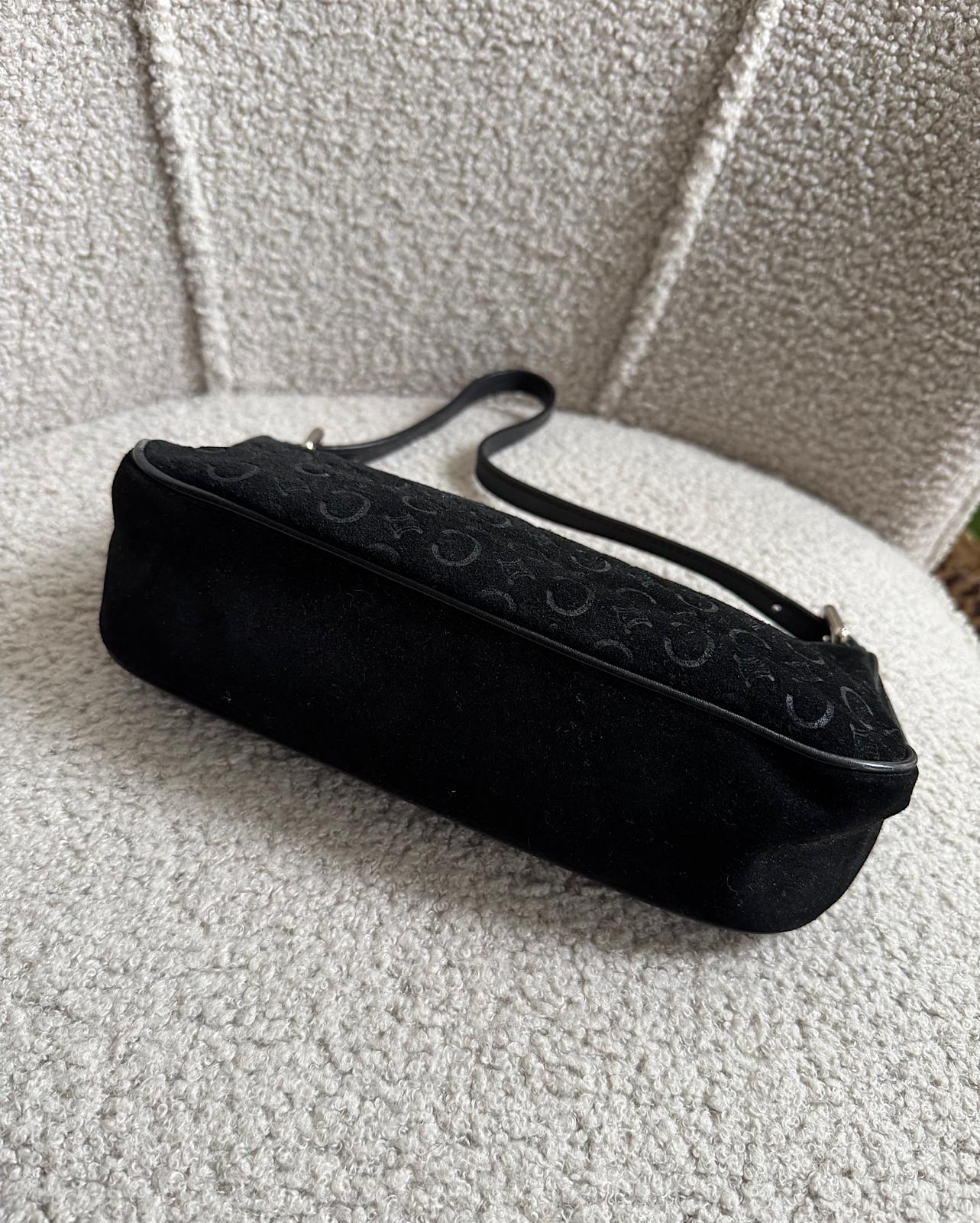 Bottom view of stunning black suede vintage bag by Celine.