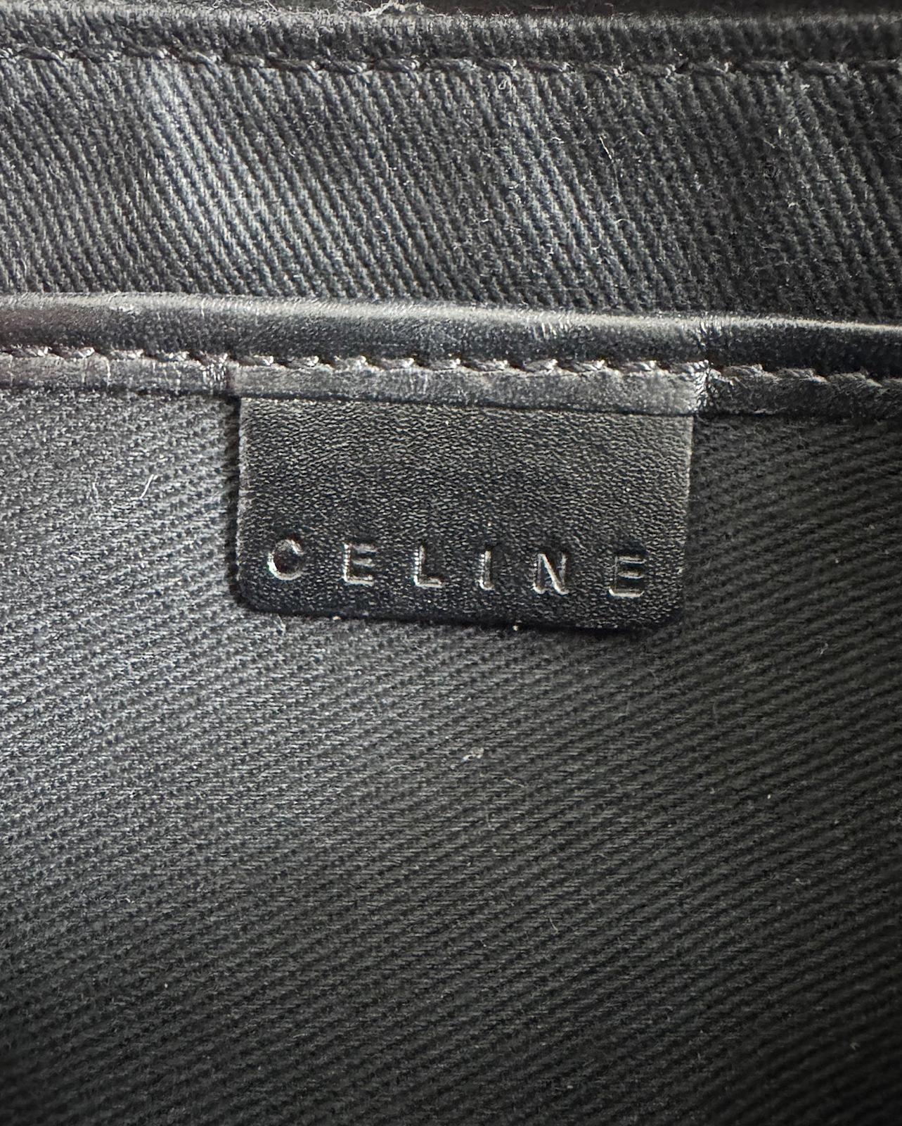 logo of stunning black suede vintage bag by Celine.