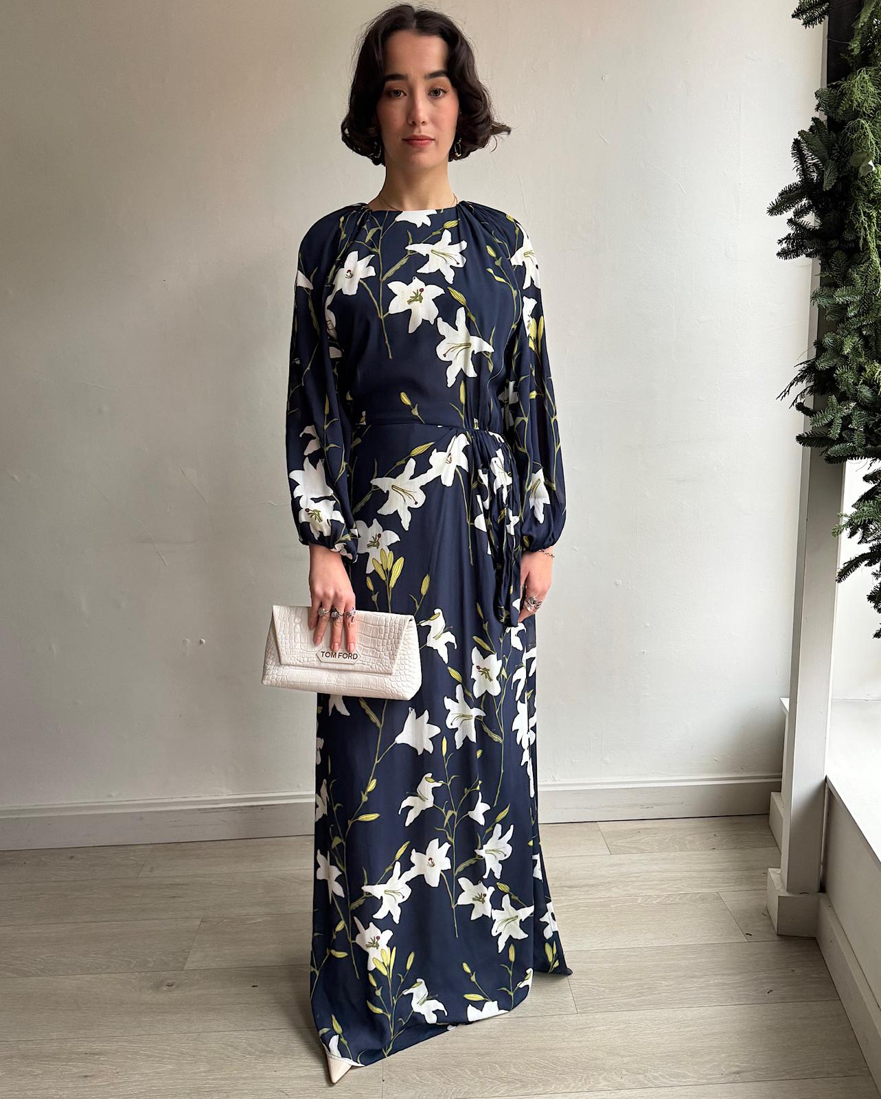 Front view of The 'Evian' maxi dress, designed by Bernadette, showcases a stunning navy lily print.