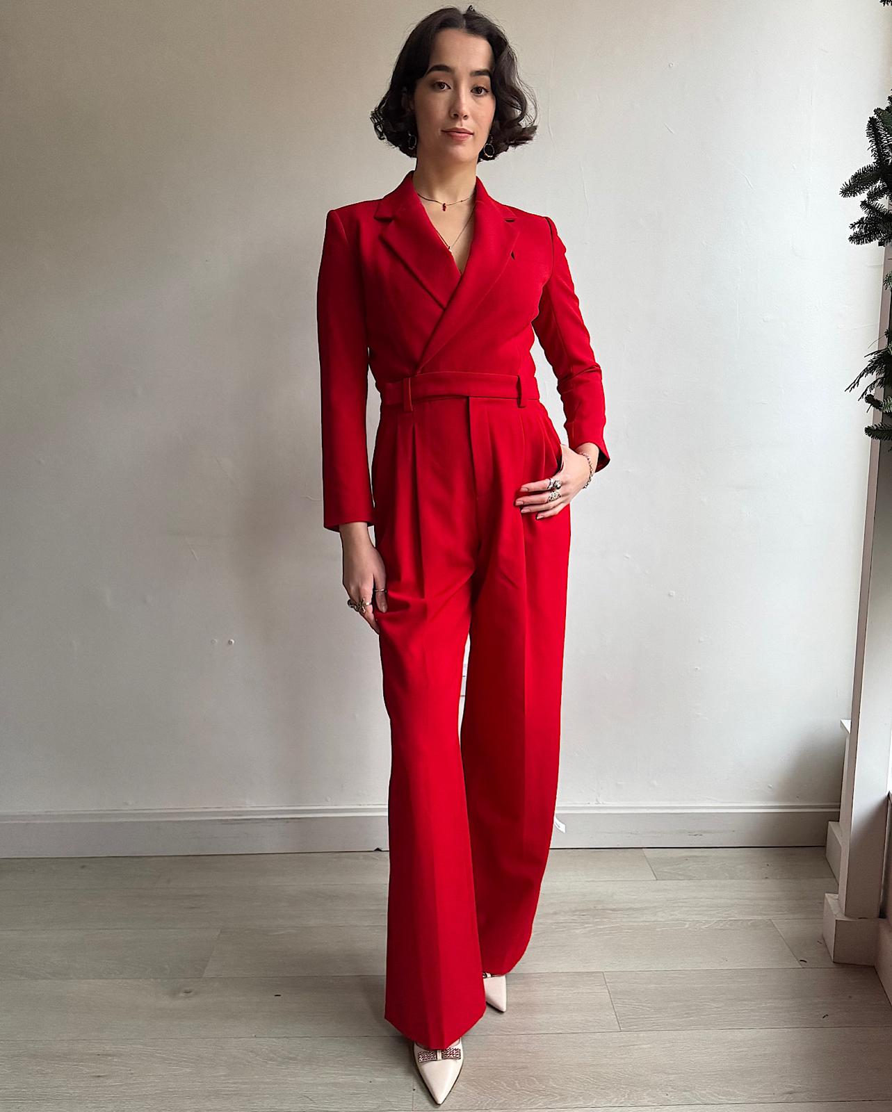 Front view of  stylish red 'Tatum' jumpsuit by A.L.C featuring padded shoulders, a high waist and a cut-out detail at the back. 