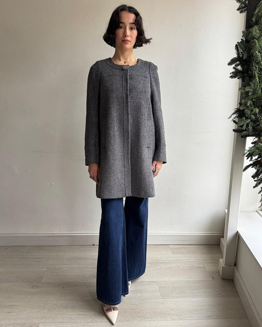 Front view of beautiful and elegant metallic pewter coat designed by Goat, now known as Jane Lewis Atelier.