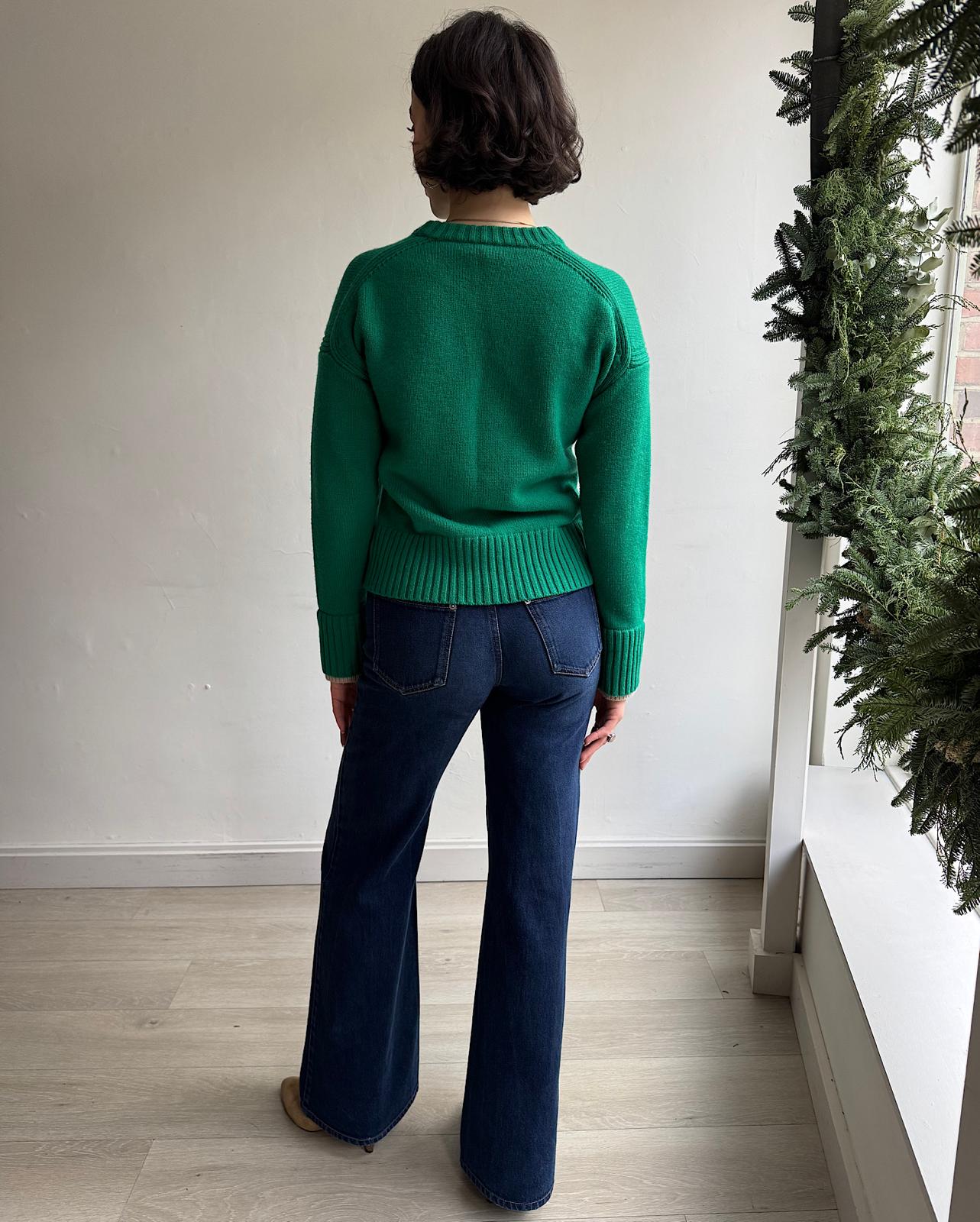 Back view of striking green cashmere blend knit by ME+EM worn without detachable cowl neck