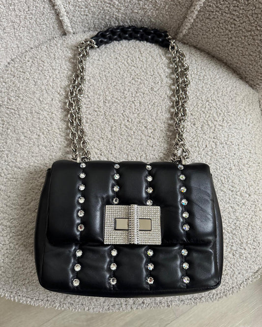 Front view of beautiful Natalia quilted napa leather bag by Tom Ford features a flap top with a crystal turn-lock closure and comes with a chain and leather strap.