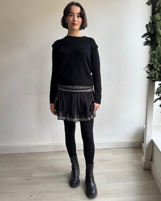 Front view of exquisite Picadilia mini-skirt from Isabel Marant Etoile features delicate cotton fabric, eye-catching embroidery, and a full lining